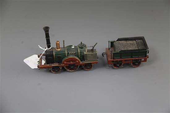 A Marklin electric locomotive and tender, The Fury, loco 5.5in. tender 3.75in. carriages 5.5in.